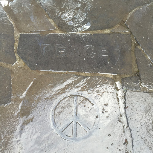 One of Many Slate Pavers Engraved With the Word ‘Peace’ Around the Base of the New Zealand Peace Bell